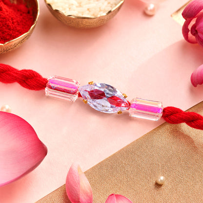 Red Thread Rakhi with Pink and Clear Crystal Bead Pendant Accents