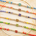 Square Motif Stone Band Rakhi in Mix Colour Threads (Pack of 6)