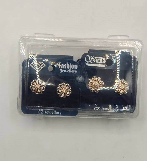 Set of four gold plated stud earrings including heart, flower, and butterfly motifs