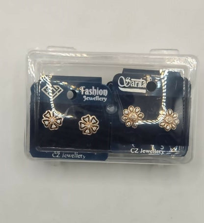 Set of four gold plated stud earrings including heart, flower, and butterfly motifs