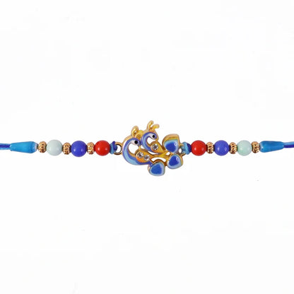 Rakhi – Elegant twin peacock designer festival ornament