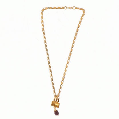 Detailed craftsmanship of the Rudraksha bead and pendant on necklace