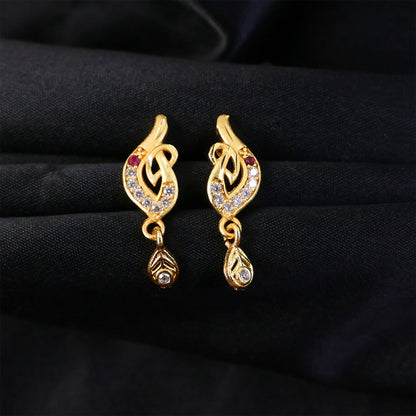 Gold leaf drop earrings hanging showing teardrop charm