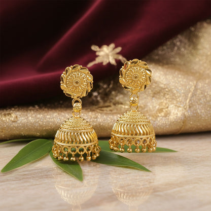 Designer gold plated jhumka earrings showcasing detailed patterns