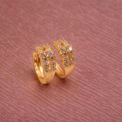 Elegant hoop earrings with gold-tone and crystal embellishments