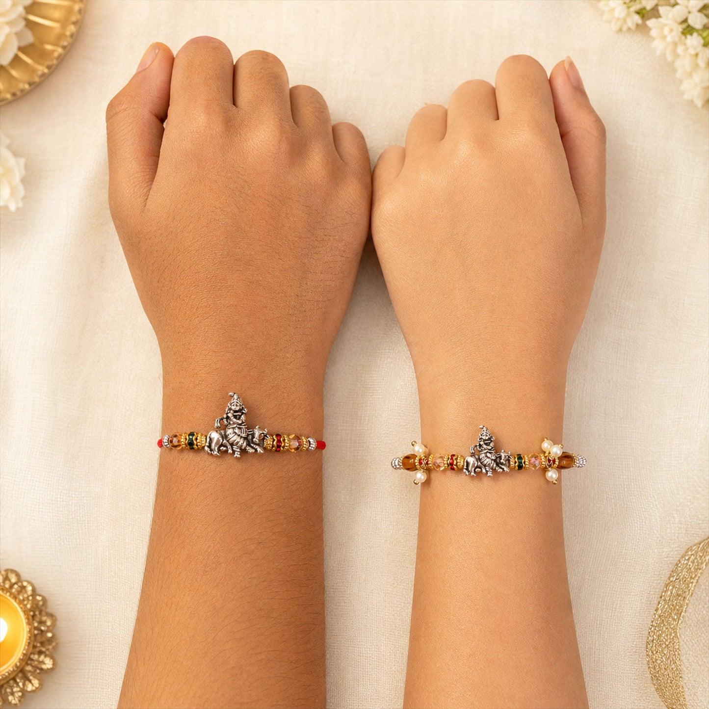 Silver Ganesha Couple Rakhi Set with Amber Crystal Beads and Pearl Lumba Charm Gift