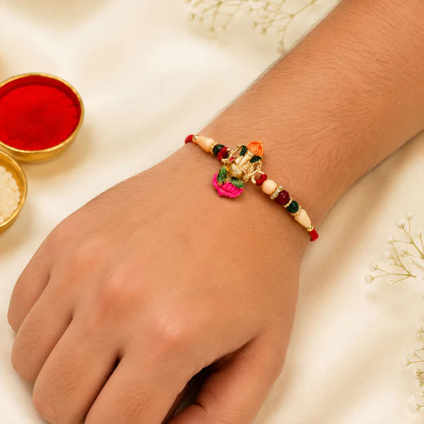 Ganesha Rakhi – Traditional Wooden Beads with Colorful Accents