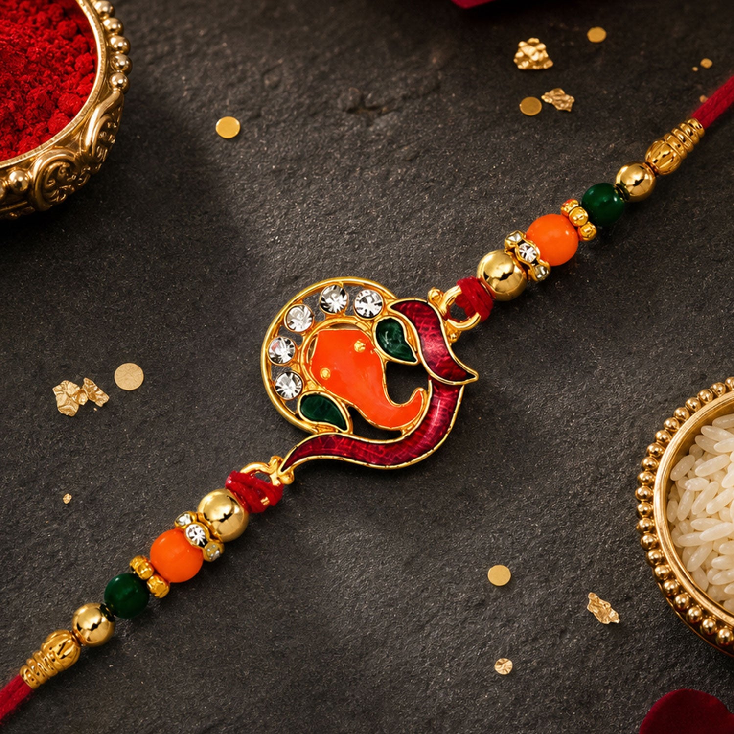 Ganesha Rakhi – Golden with Red-Green Beads & Stone Work