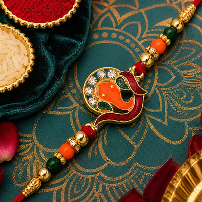 Ganesha Rakhi – Golden with Red-Green Beads & Stone Work