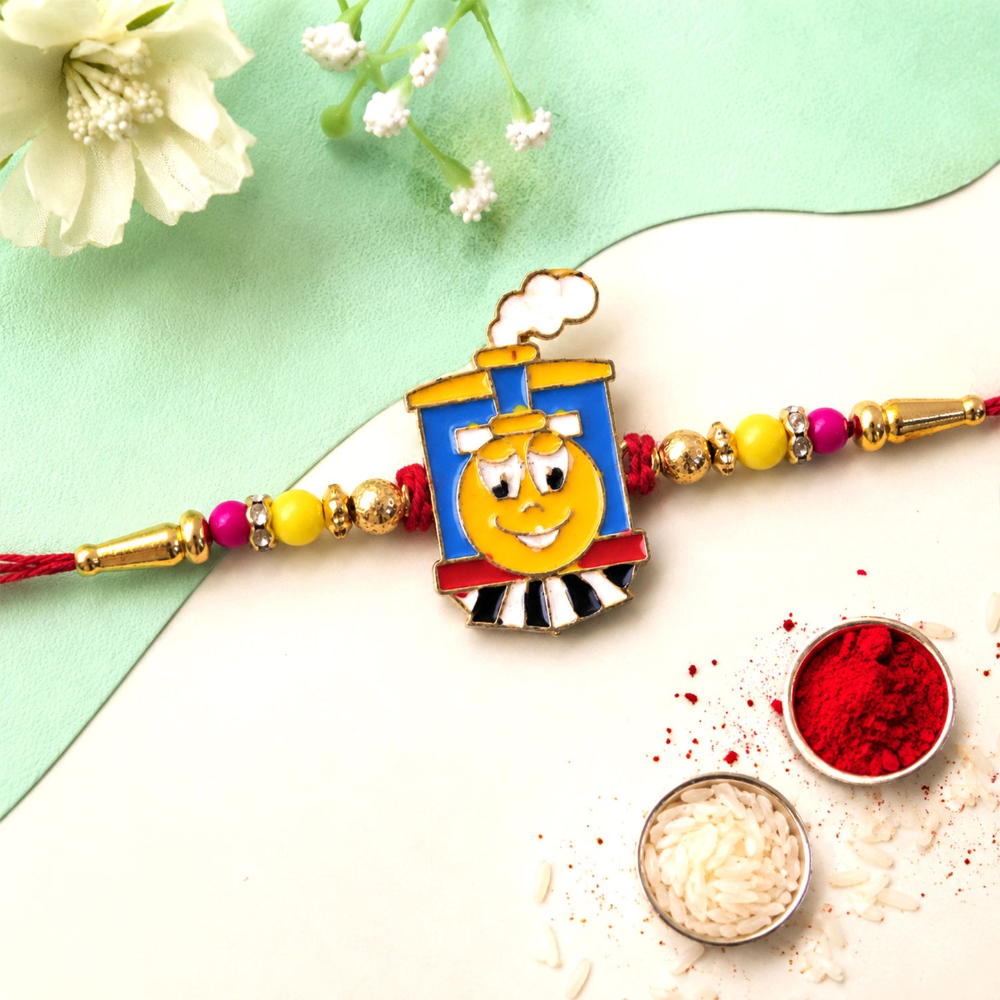 Train Cartoon Kids Rakhi – Colorful Beads & Red Thread Festive Gift