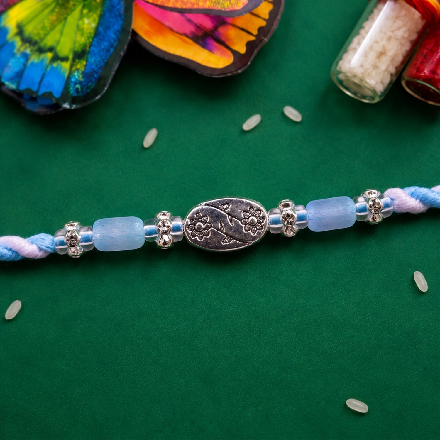 Blue Silver Stone Rakhi with Elegant Bracelet Style and Premium Festive Shine