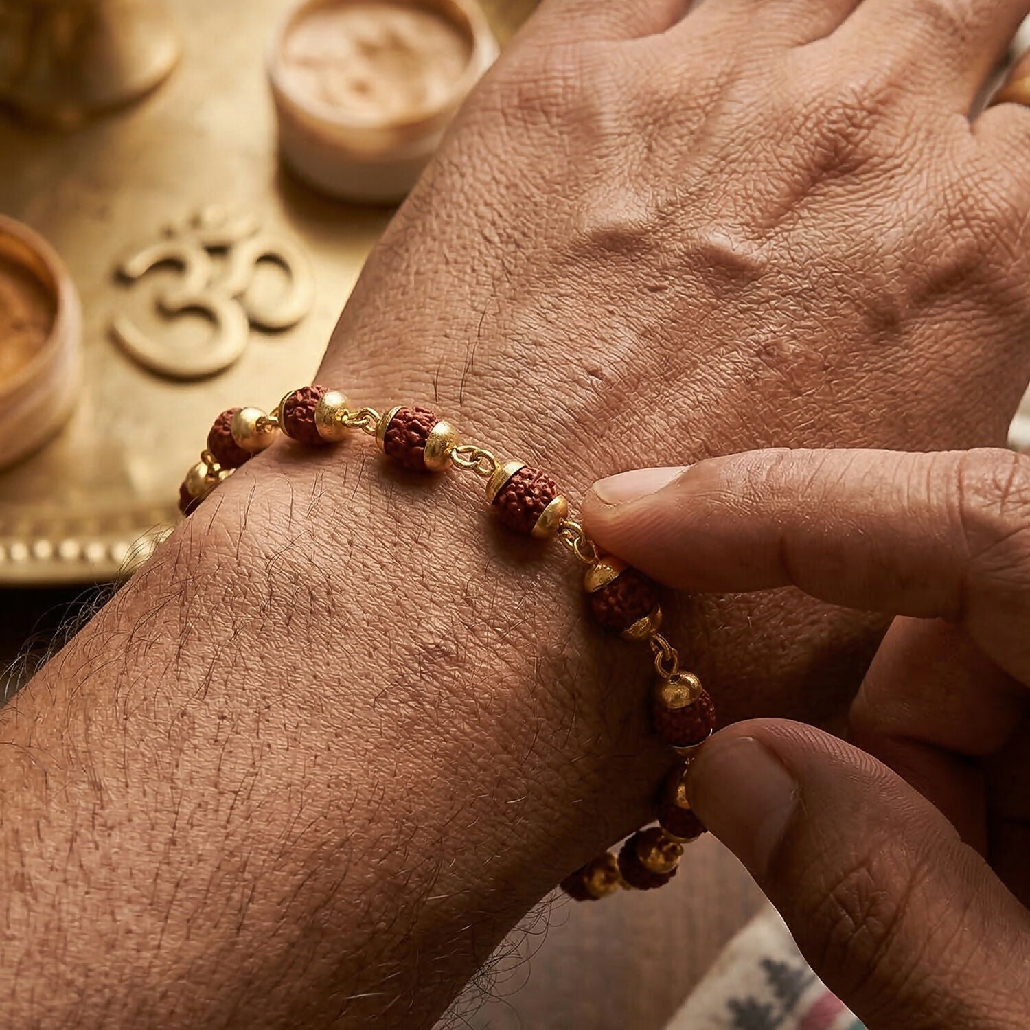 Close-up of Rudraksha beads with gold accents