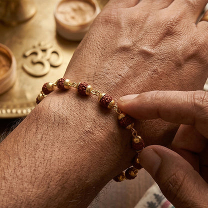 Close-up of Rudraksha beads with gold accents