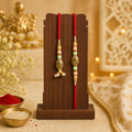 Divine Circular Medallion Bhai Bhabhi Rakhi with Oval Charm and Bead Accents for Gift