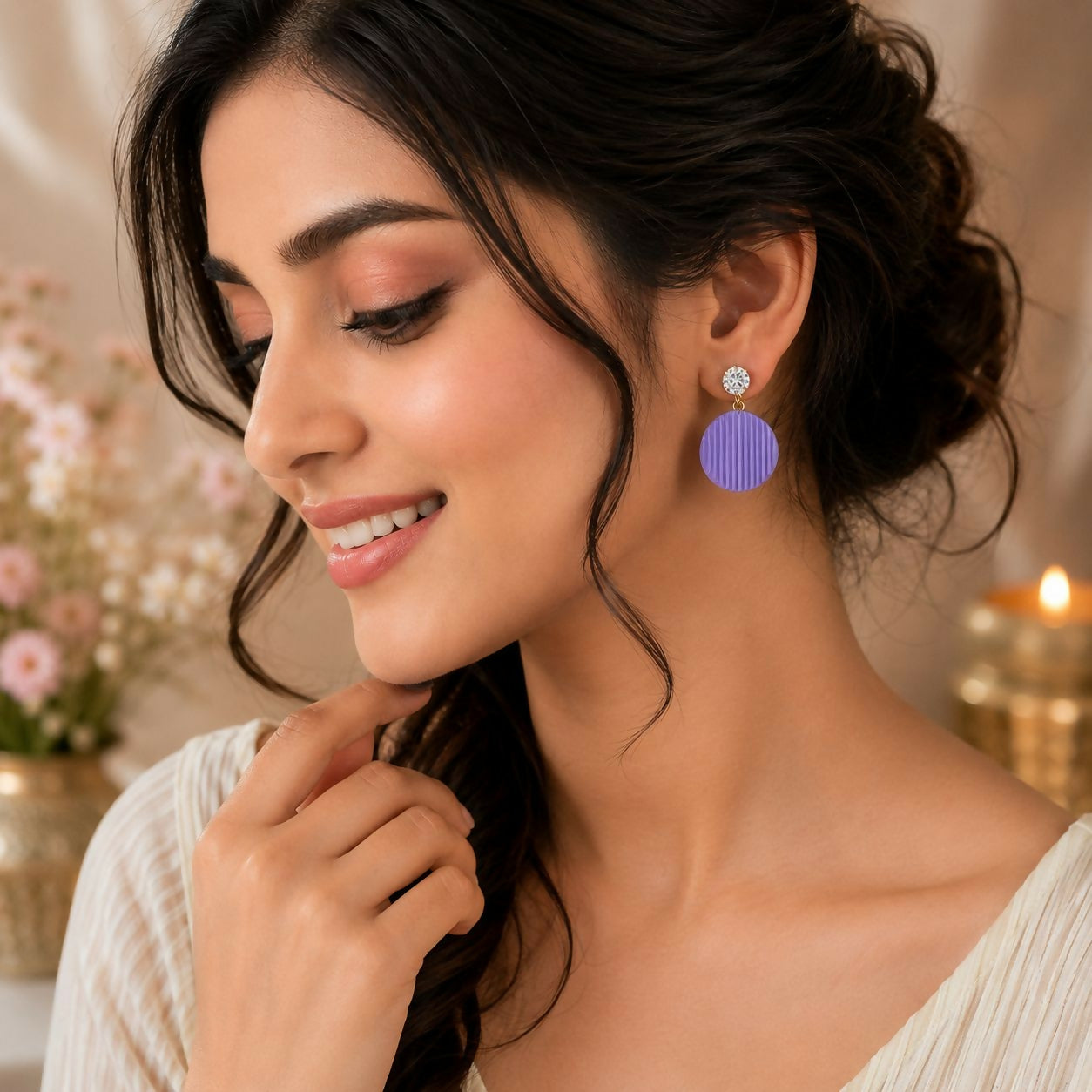 Assortment of colorful round drop earrings featuring crystal studs, arranged neatly to show the full collection.