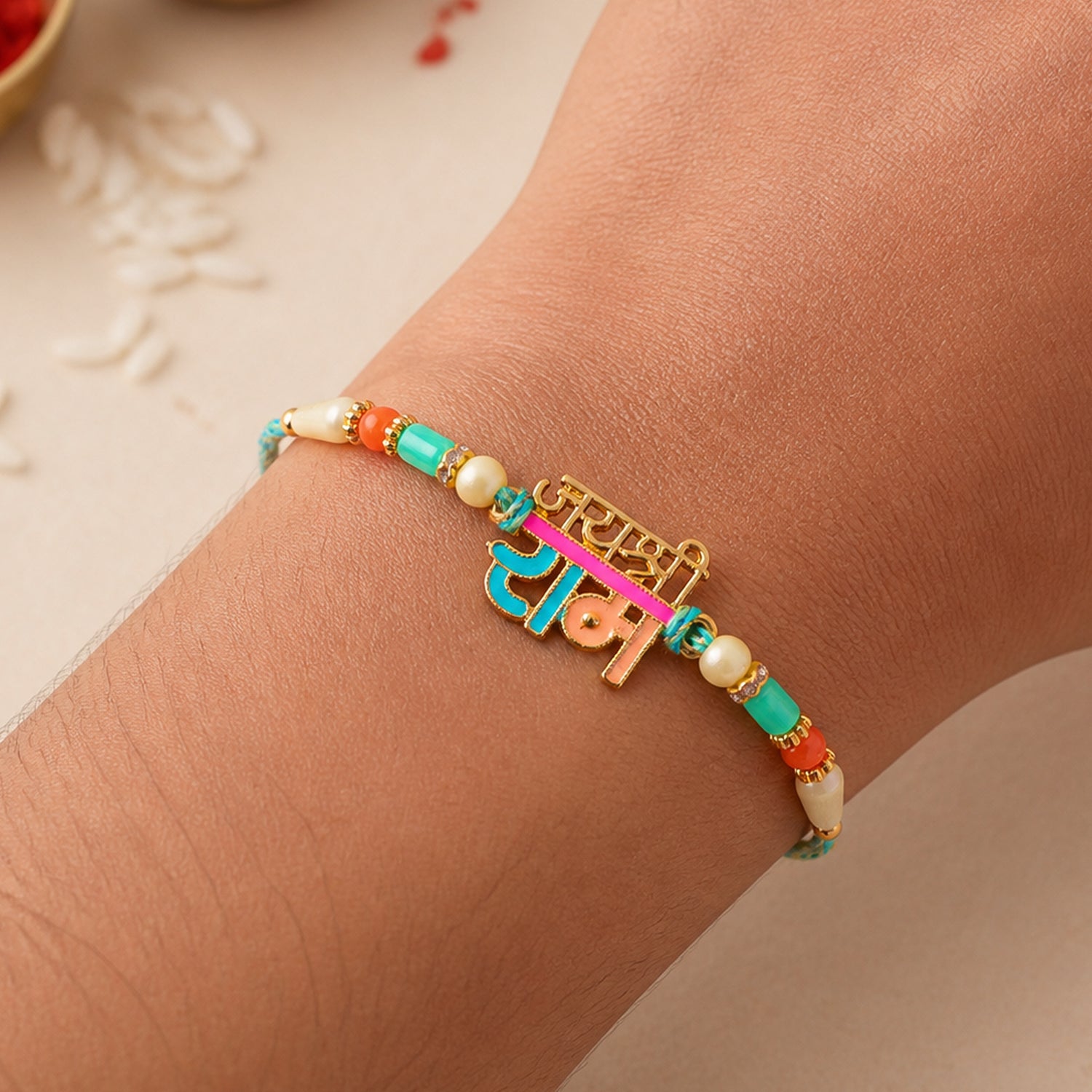 Premium Rakhi showcasing Jai Shri Ram Plaque, gold trims and chain look for Gift Use