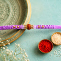 Purple Stone Pearl Rakhi – Elegant Soft Beads & Bracelet Look