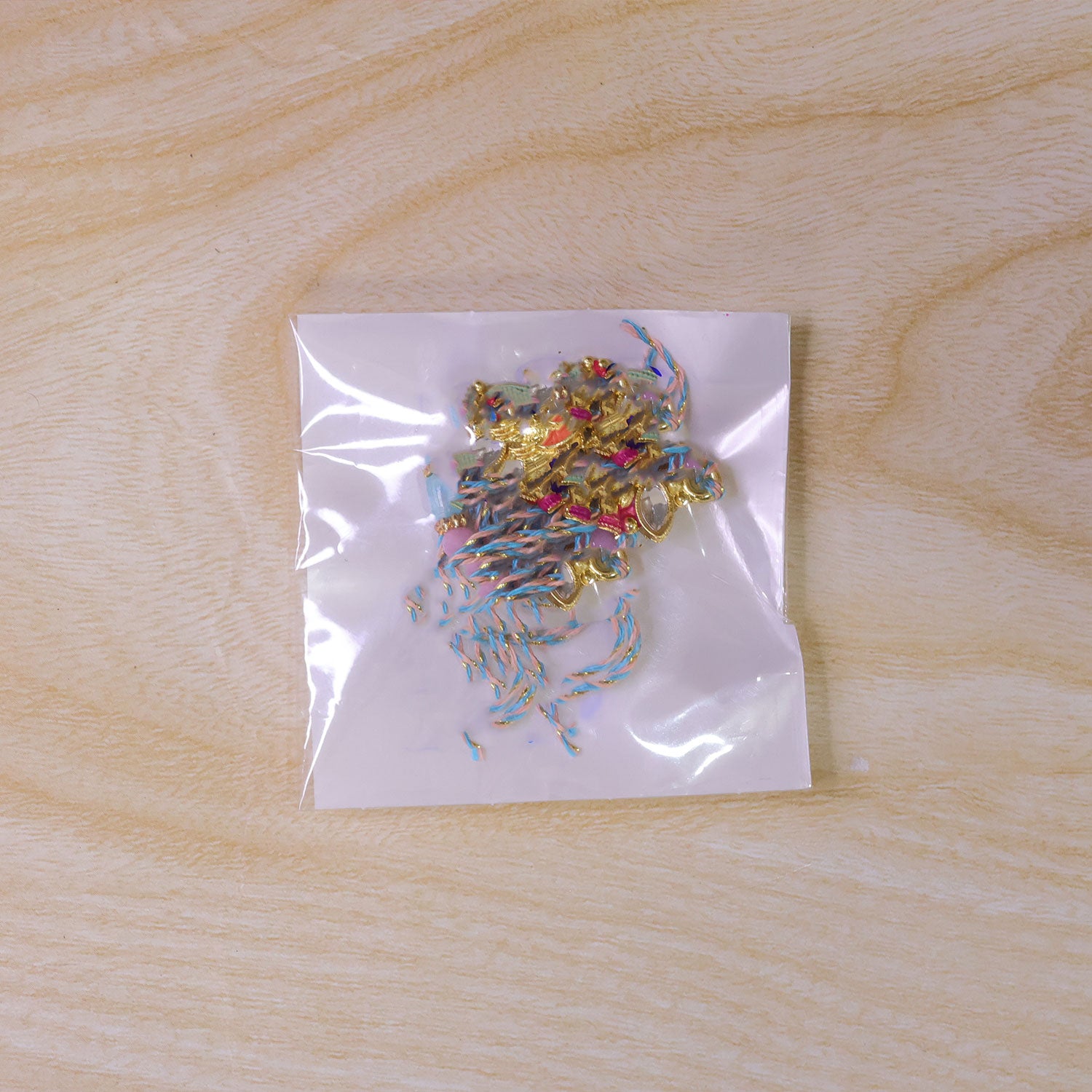 Textured Gold Elephant Pendant Rakhi with Multicolor Kundan