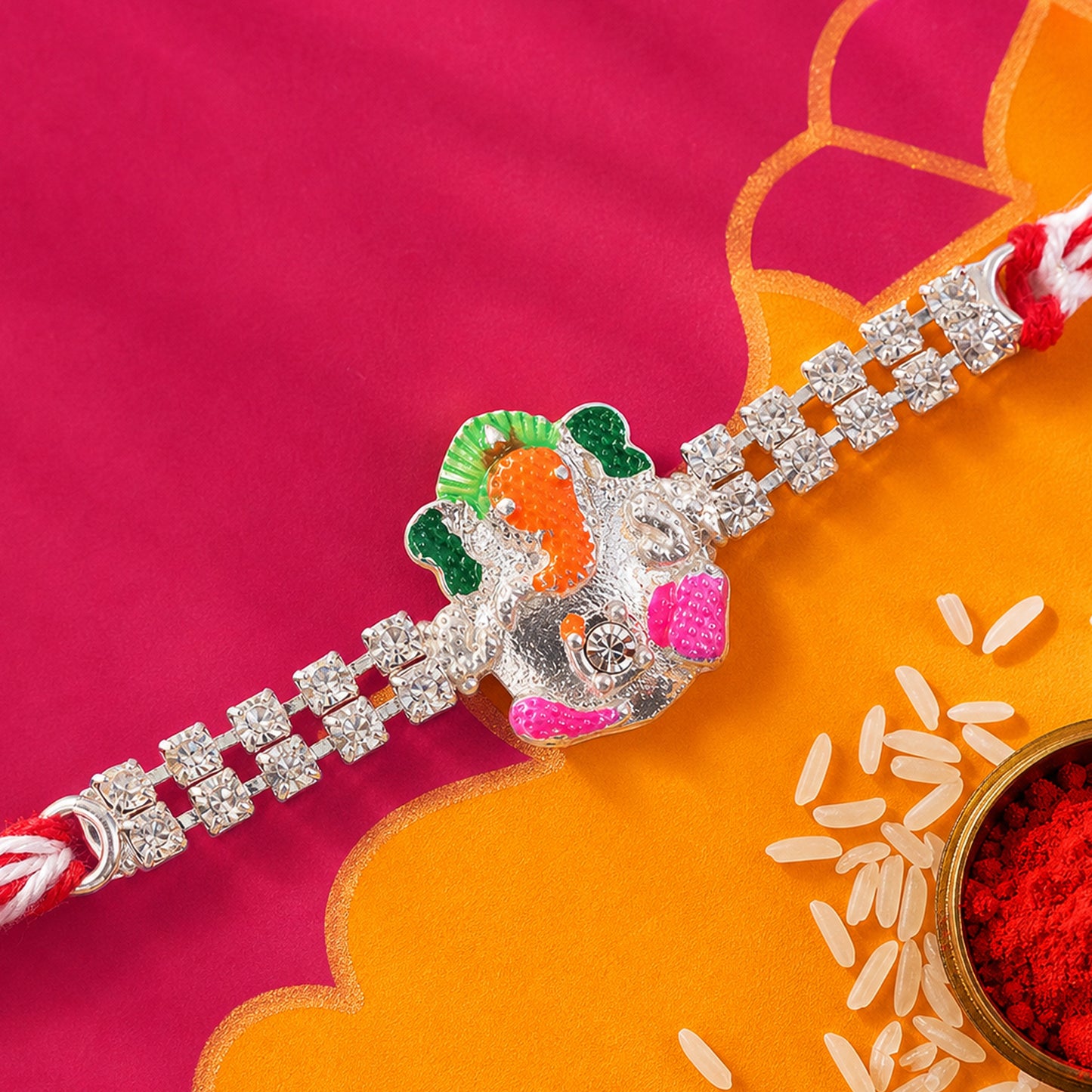 Elegant Rakhi featuring Ganesha Charm, crystal accents and thread style for Gift Use