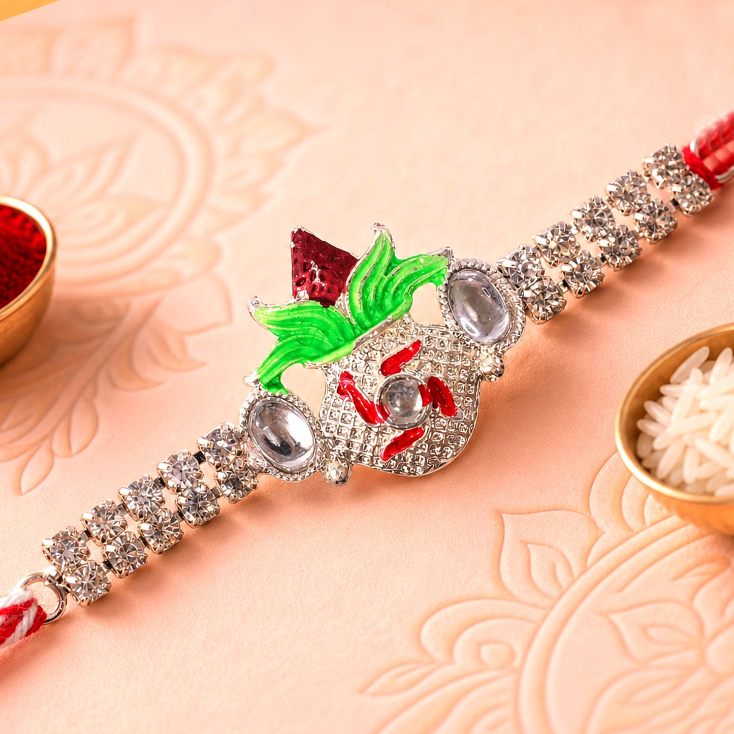 Ornate Rakhi with Leaf Floral Charm, multicolor stones and chain look for Festive Use