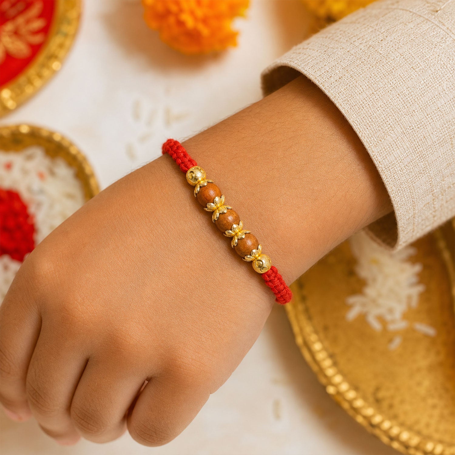 Red Braided Rakhi with Natural Wooden Bead Pendant Accents