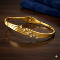Eternal Bloom Gold-Tone Botanical Kada Bracelet – Feminine Charm and Style