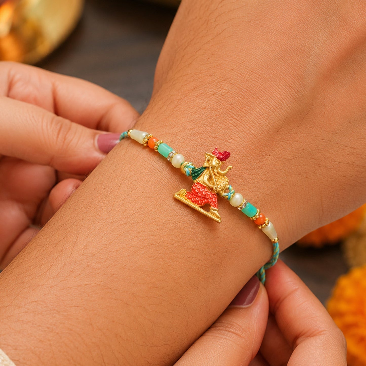 Ganesh Charms Rakhi with Turquoise and Pearl Beads Elegant Festival Accessory (5pcs)