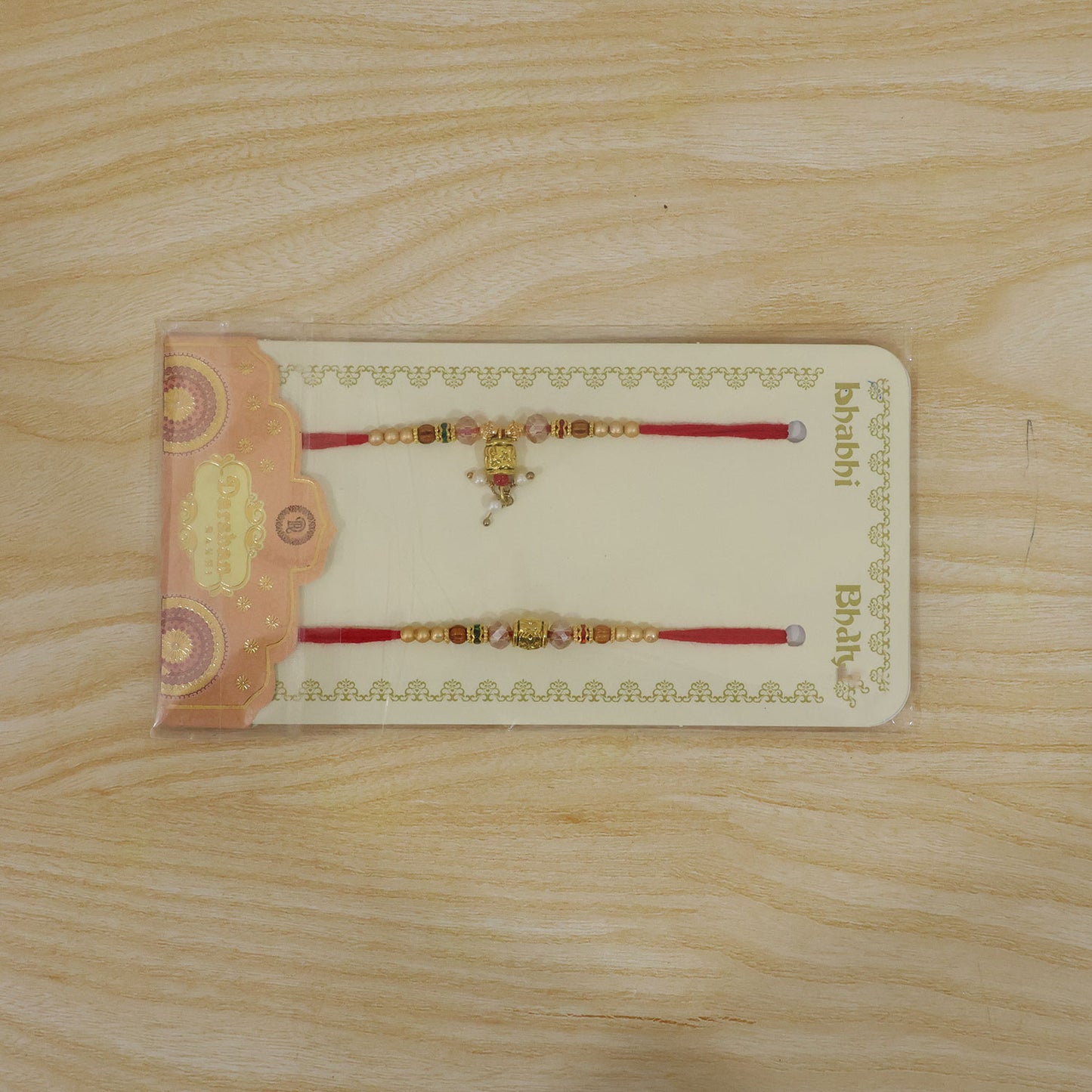 Antique Engraved Cube Bhai Bhabhi Rakhi with Crystal, Beads and Pearl Drops