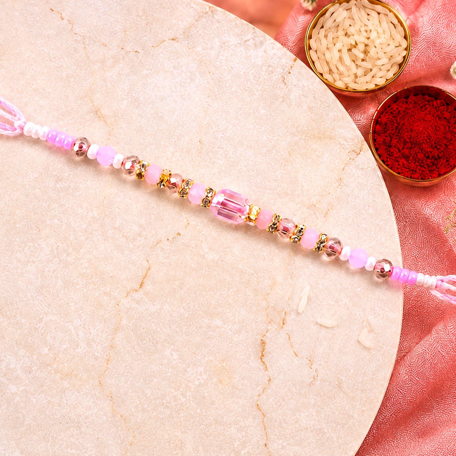 Soft Pearl Beaded Rakhi with Delicate Colors and Beautiful Bracelet Style Finish
