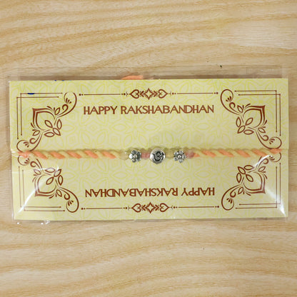 Graceful Pastel Bracelet Rakhi with Silver Centre and Delicate Raksha Bandhan Beauty
