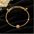 Gold-Tone Adjustable Bangle Bracelet with Stone-Studded Ball Charm for Women
