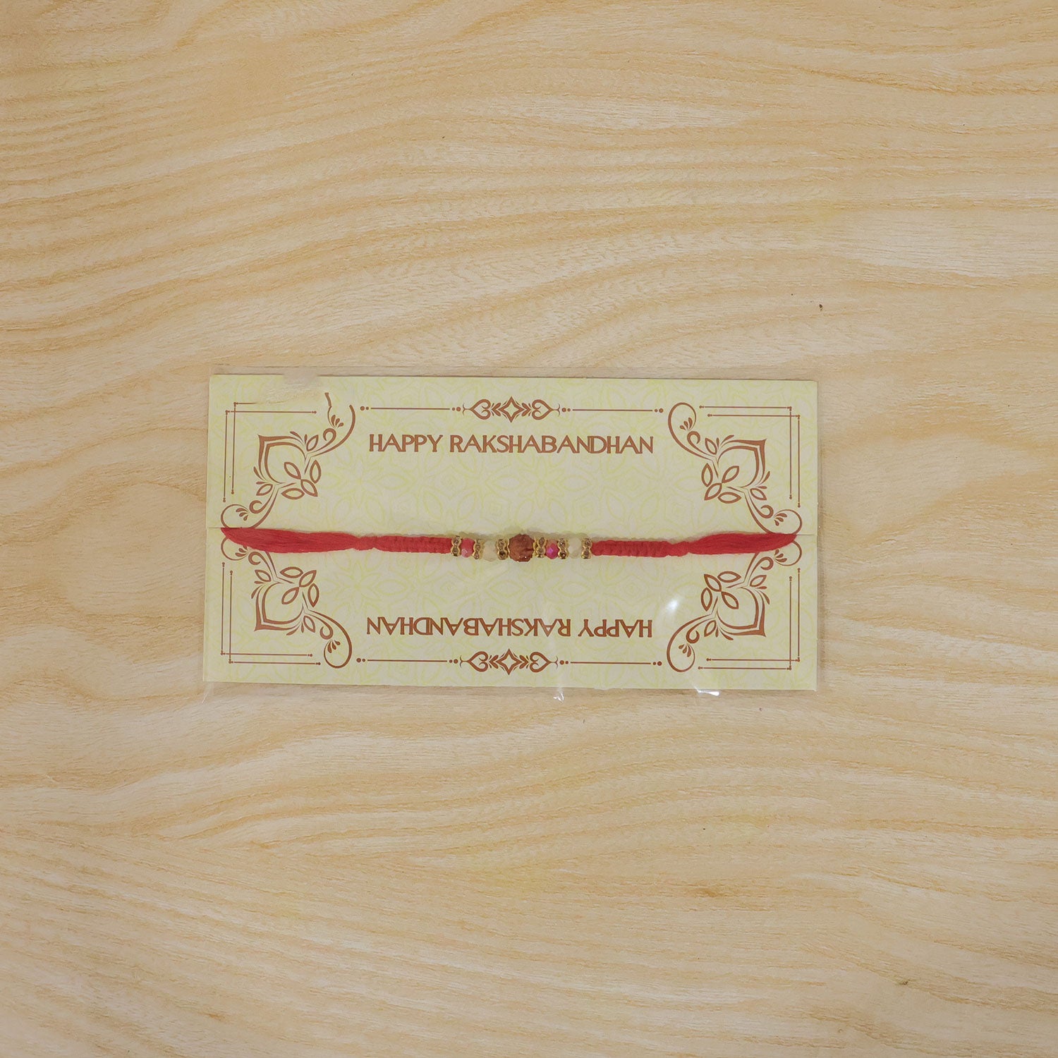 Stone Studded Designer Rakhi with Traditional Beads and Beautiful Festive Finish