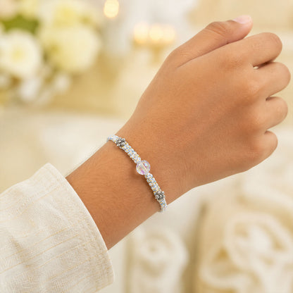 Pastel Braided Rakhi with Blue-White Thread and Crystal Bead Charm for Raksha Bandhan