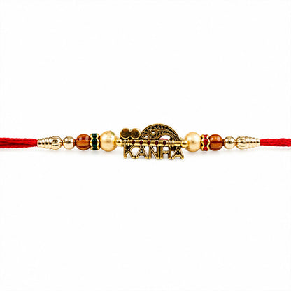 Kanha Krishna Devotional Rakhi with Peacock-Flute Style Golden Centre and Red Beads