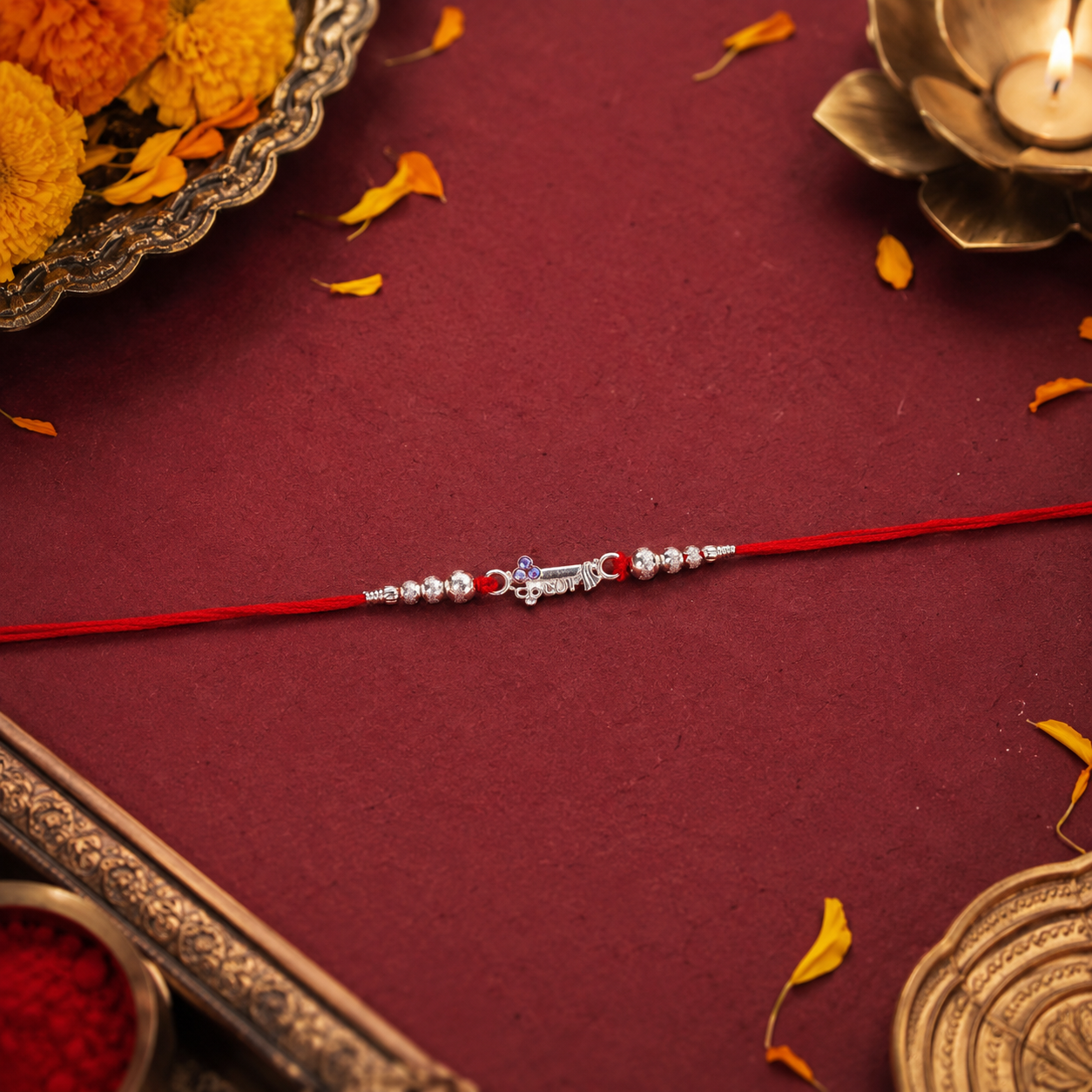 Silver Morpich Krishna Bead Rakhi with Tiny Purple Stone and Red Thread