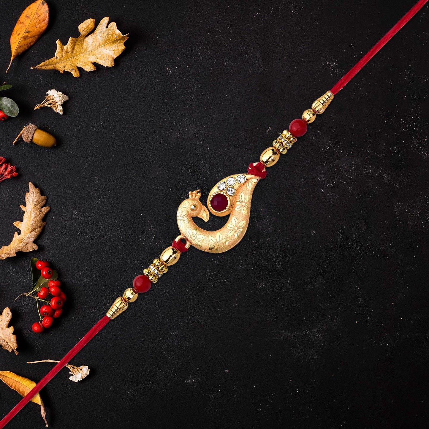 Peacock Feather Rakhi, Golden & Kundan Detailed Red Thread (10pcs)