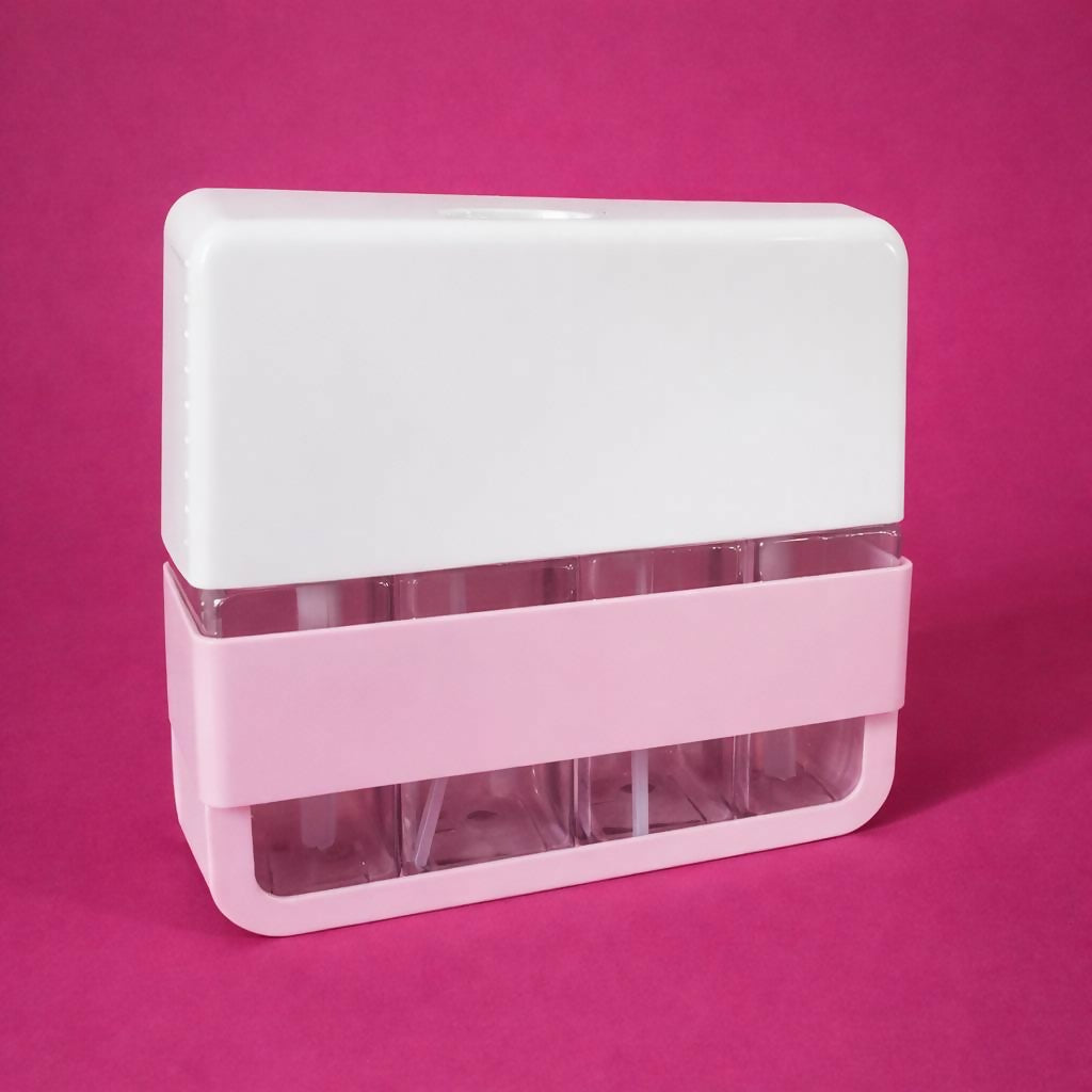 Pink refillable bottles arranged in compact travel holder
