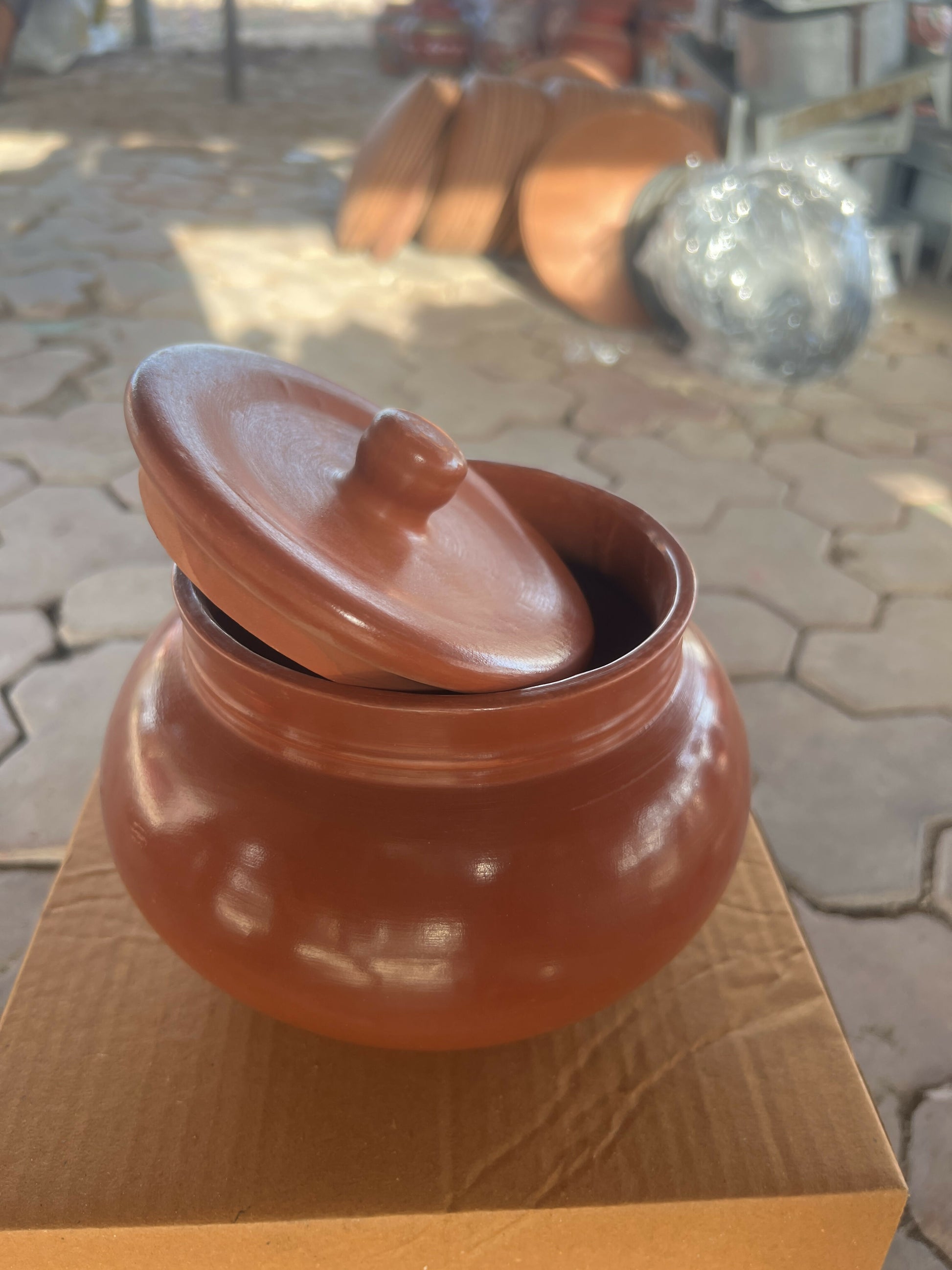 Close-up of natural terracotta clay surface of dahi handi pot