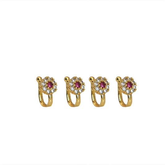 Close-up of ruby floral nose clip-on ring with gold plating and Cubic Zirconia accents