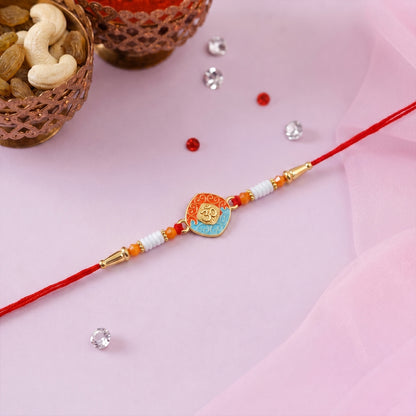 Close-up of OM Symbol centerpiece on Rakhi