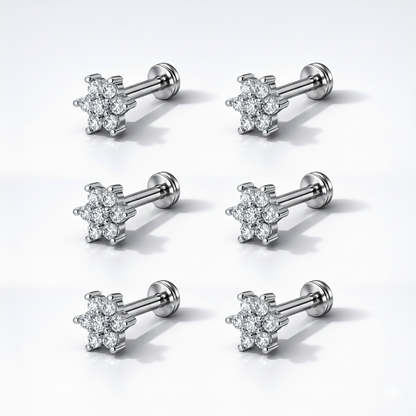 Silver plated crystal flower stud earrings sparkling under light, showing detailed floral design
