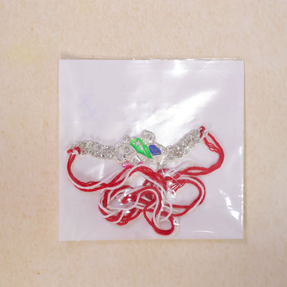 Classic Rakhi with Peacock Swirl Charm, crystal sparkle and thread look for Gifting