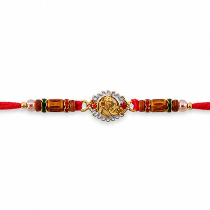 Ganesha Silver Ring Devotional Rakhi with Circular Centre and Red Green Beads