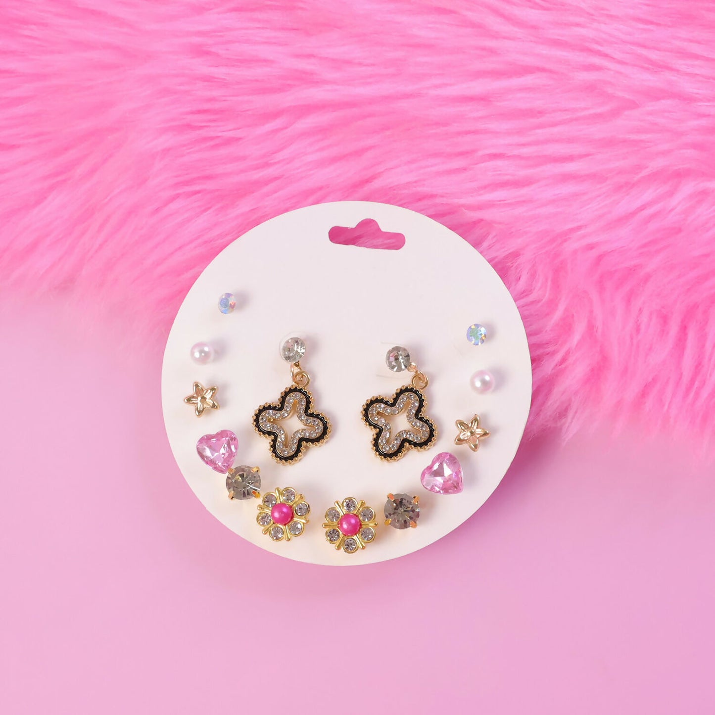 Close-up of pearl stud earrings from the Korean style multi design set