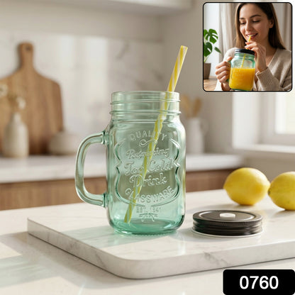 Mason Jar with Handle filled with drink and reusable straw