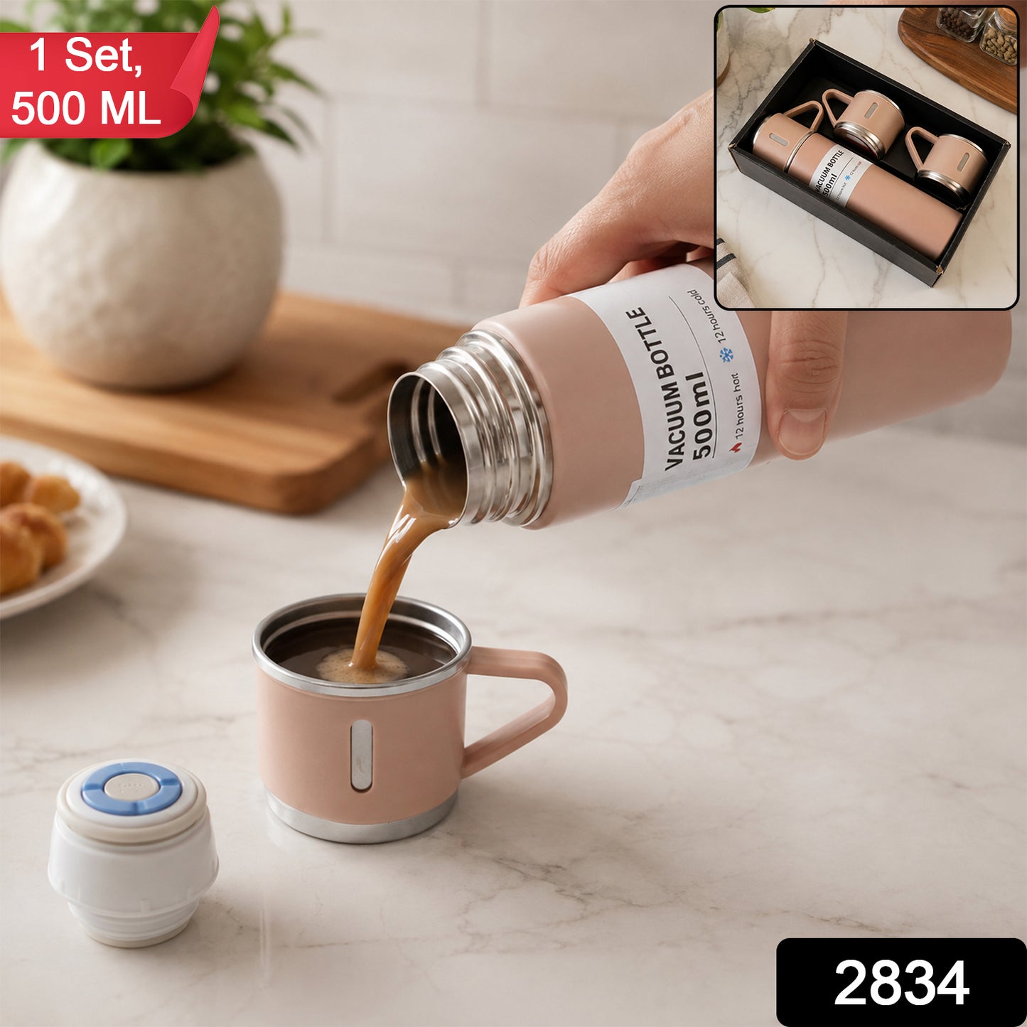 A hand pours coffee from a pink vacuum flask into a matching cup, with a small speaker and plant, and a gift box inset.