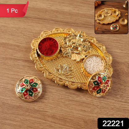 Golden Ganesh pooja accessory with detailed scalloped border