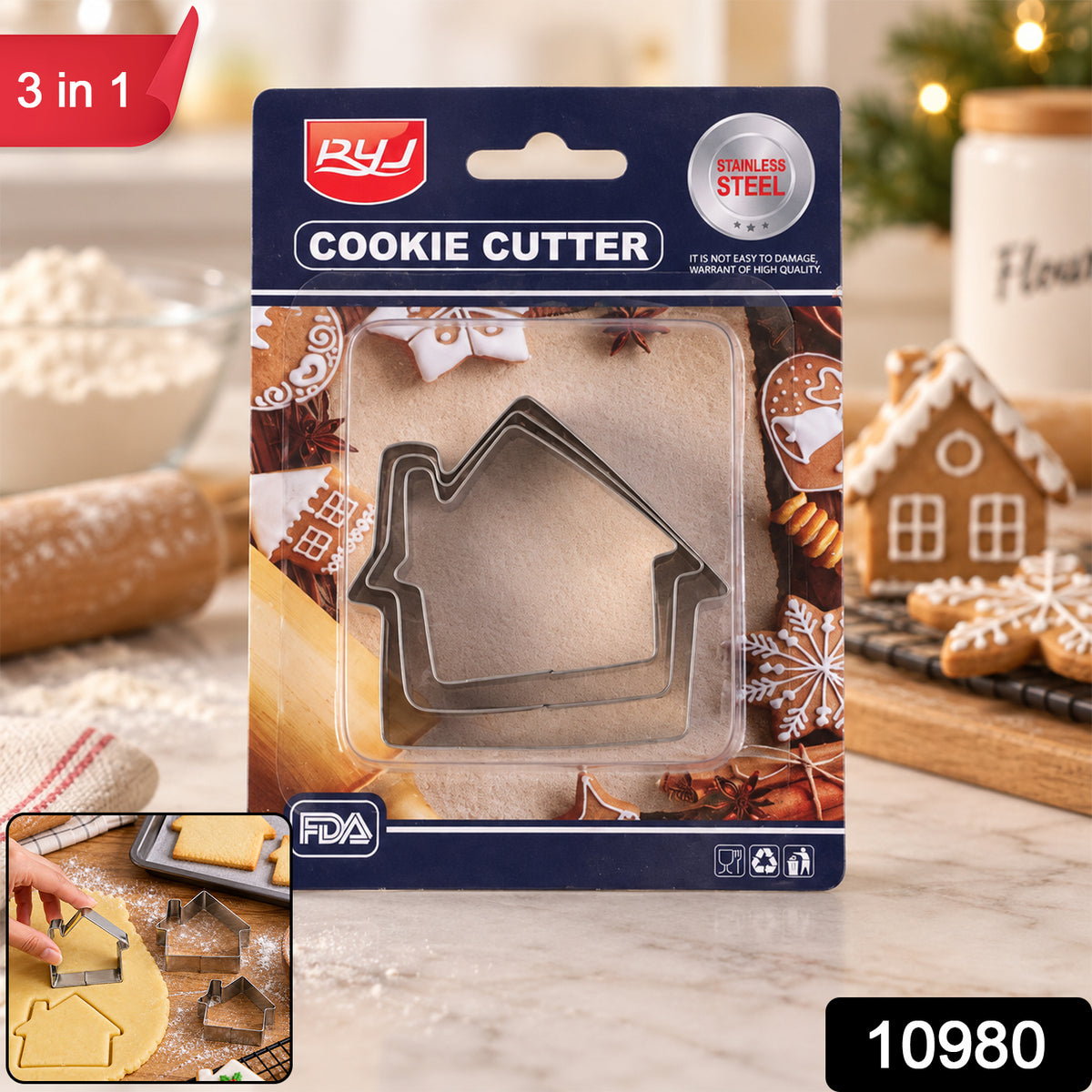 Packaged house-shaped cookie cutters with a small inset showing a hand pressing a cutter into dough.