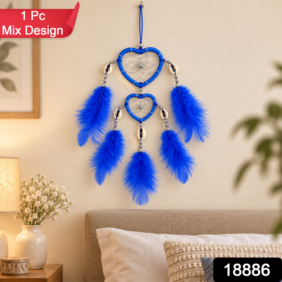 A blue heart-shaped dream catcher with feathers and silver beads hangs on a light wall, with a red banner saying "1 Pc Mix