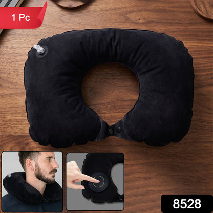 Close-up of the soft flocked PVC surface on a black inflatable travel pillow